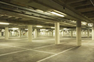 Empty parking garage at night.