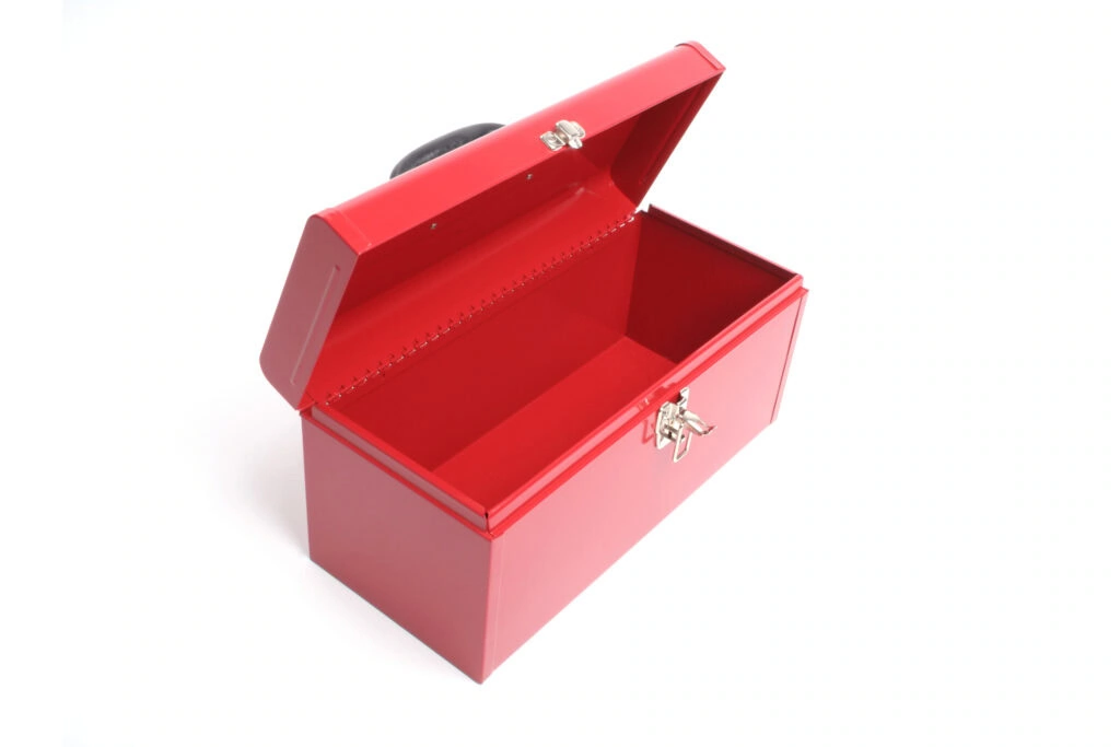 A red metal toolbox on a white background