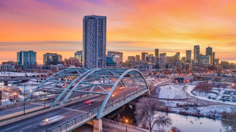 City with bridge and cars moving.